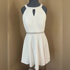 White dress worn for rehearsal dinner. Like new.